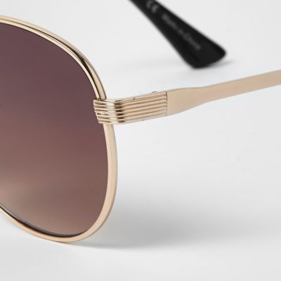 Gold tone brow bar aviator sunglasses